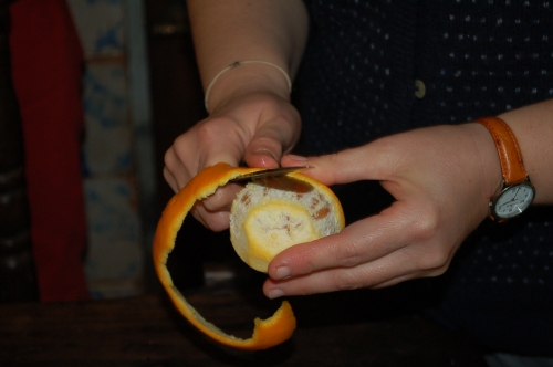 Ninfa, nimbliy peeling an orange