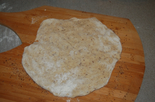 place the pizza dough on the paddles